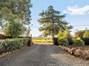 Full perimeter fencing and gated on both sides of the circular driveway for so much privacy!