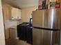 Washer/dryer, refrigerator in laundry room, all stay!